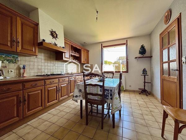 Maison de plain-pied, 95 m² habitables, garage