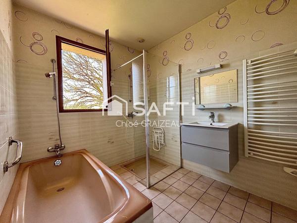 Maison de plain-pied, 95 m² habitables, garage