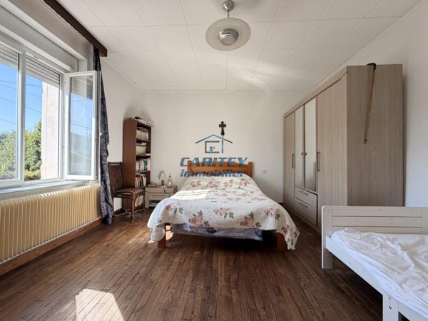 Maison individuelle plain pied en pierre – 90 m² – 3 chambres – Terrain 1 468 m²