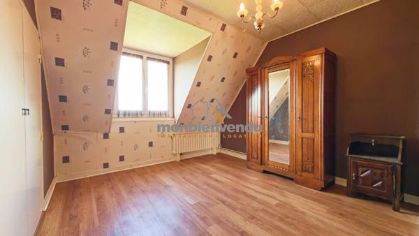 Maison familiale avec 6 chambres et sous-sol complet