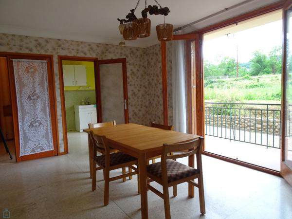 Appartement 3 pièces avec balcon, 2 garages et cave