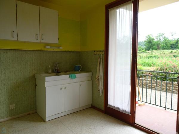 Appartement 3 pièces avec balcon, 2 garages et cave