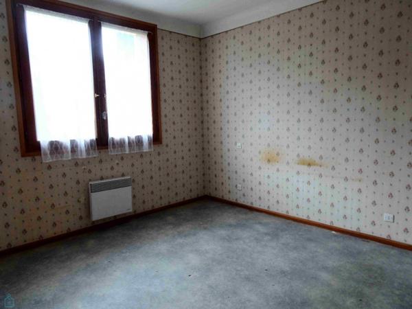 Appartement 3 pièces avec balcon, 2 garages et cave