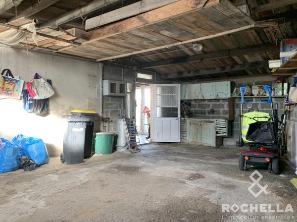 Maison 107m2, 3/4chambres, grand jardin, garage attenant, dépendance.