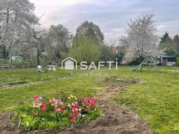 Charmante maison de ville avec grand jardin et trois garages au cœur de Douai