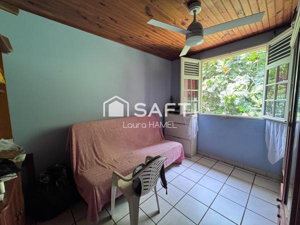 Maison T4, garage, terrain arboré.