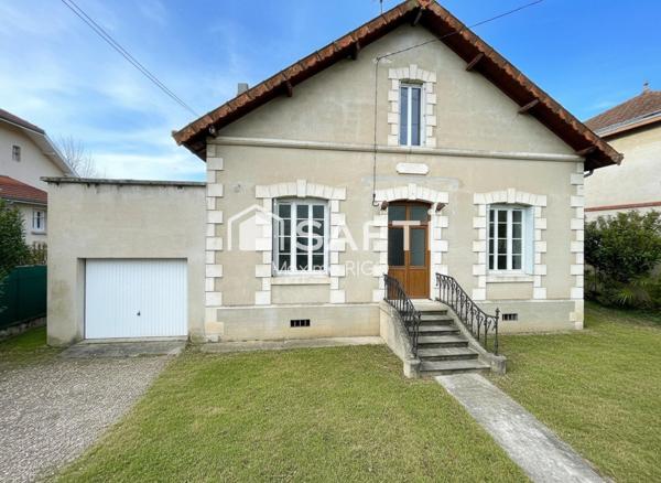 Maison de ville 7 pièces avec garage et jardin