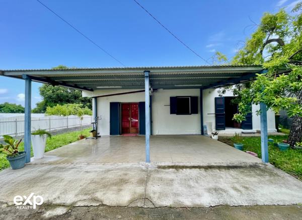 Maison de plain-pied 4 pièces avec terrasse couverte et jardin arboré
