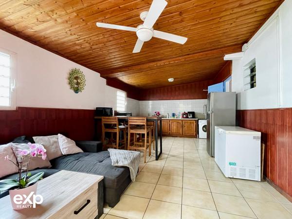 Maison de plain-pied 4 pièces avec terrasse couverte et jardin arboré