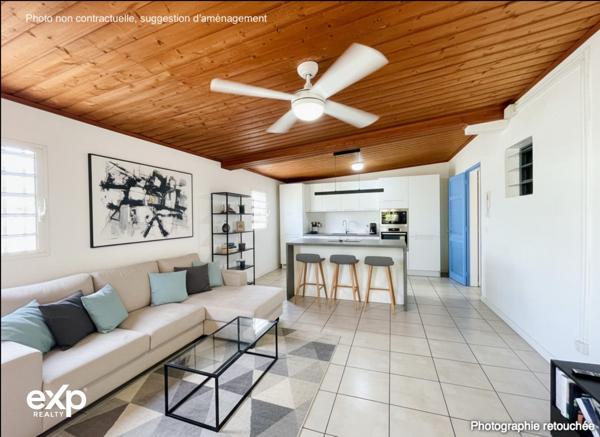 Maison de plain-pied 4 pièces avec terrasse couverte et jardin arboré