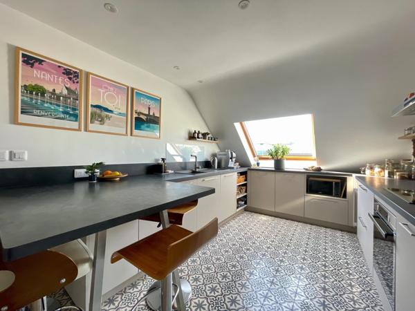 Une "Maison sous les toits" au pied du Jardin