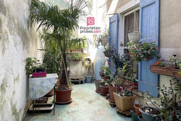 Maison de ville avec 3 appartements terrasses et garage