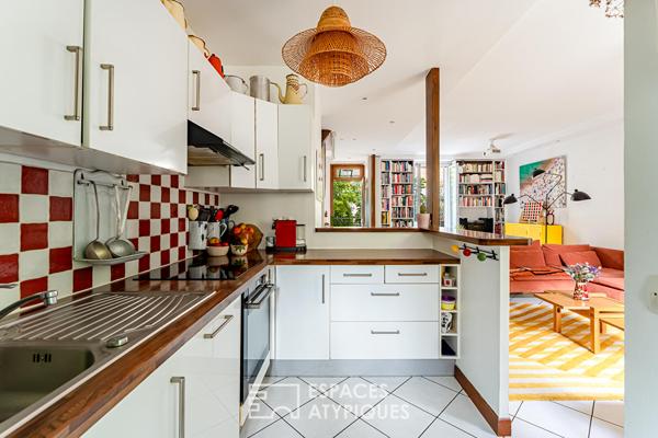 Maison familiale avec jardin intimiste et studio indépendant.