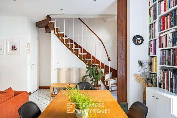 Maison familiale avec jardin intimiste et studio indépendant.