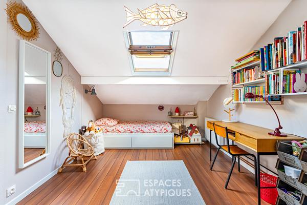 Maison familiale avec jardin intimiste et studio indépendant.