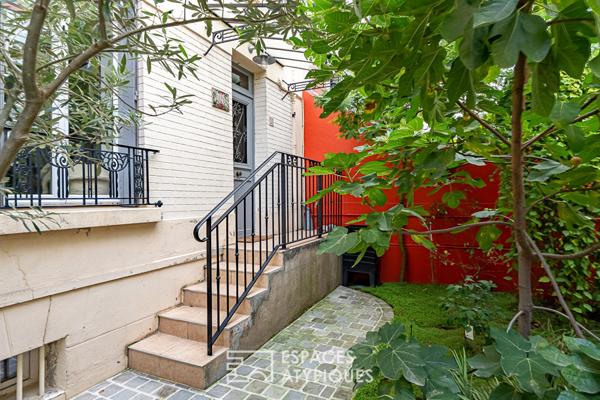 Maison familiale avec jardin intimiste et studio indépendant.