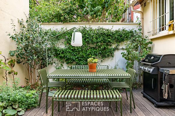 Maison familiale avec jardin intimiste et studio indépendant.