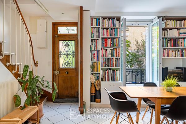 Maison familiale avec jardin intimiste et studio indépendant.