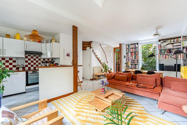 Maison familiale avec jardin intimiste et studio indépendant.