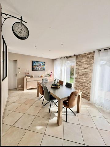 Maison de plain-pied à Montreuil-Juigné - 3 chambres - jardin - garage