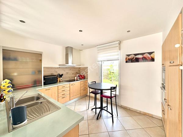 Maison de plain-pied à Montreuil-Juigné - 3 chambres - jardin - garage