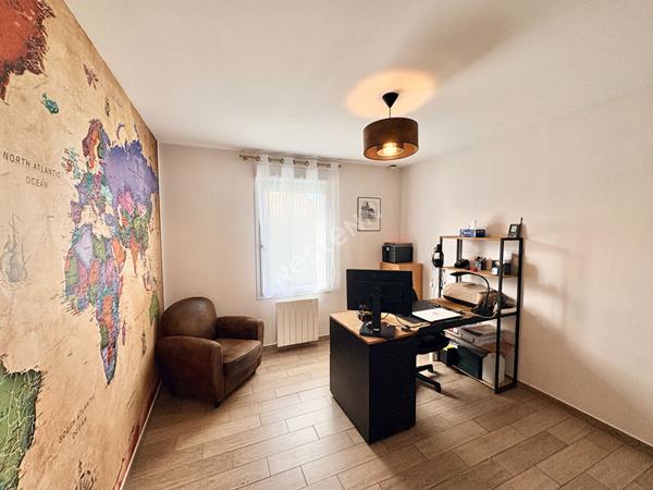 Maison de plain-pied à Montreuil-Juigné - 3 chambres - jardin - garage