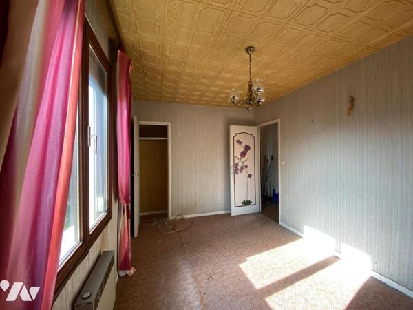 PAVILLON SUR SOUS/SOL A RENOVER