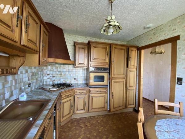 PAVILLON SUR SOUS/SOL A RENOVER