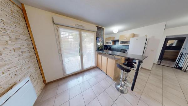 Rez-de-jardin 50 M² .A proximité des commerces