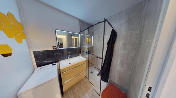 Rez-de-jardin 50 M² .A proximité des commerces