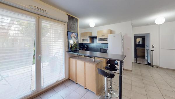 Rez-de-jardin 50 M² .A proximité des commerces