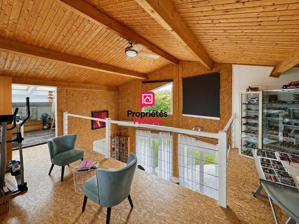 Maison à ossature bois avec vue et sous-sol complet, terrain de 3 800 m²