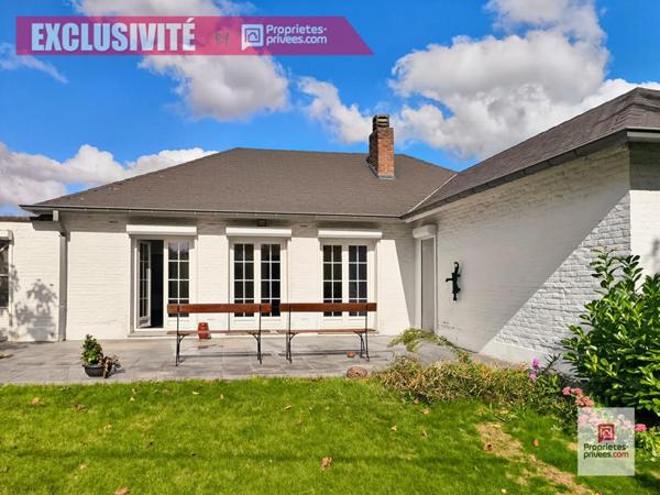 Wattrelos, idéalement situé, plain pied avec 4 chambres, jardin, double garage