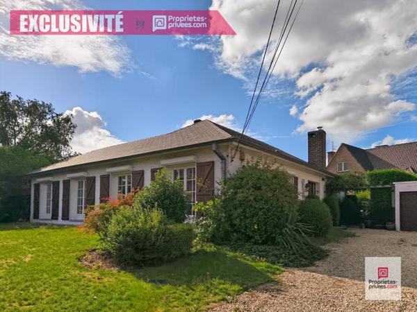 Wattrelos, idéalement situé, plain pied avec 4 chambres, jardin, double garage