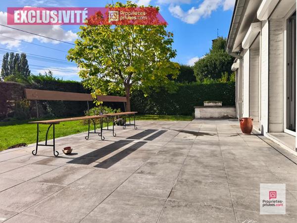 Wattrelos, idéalement situé, plain pied avec 4 chambres, jardin, double garage