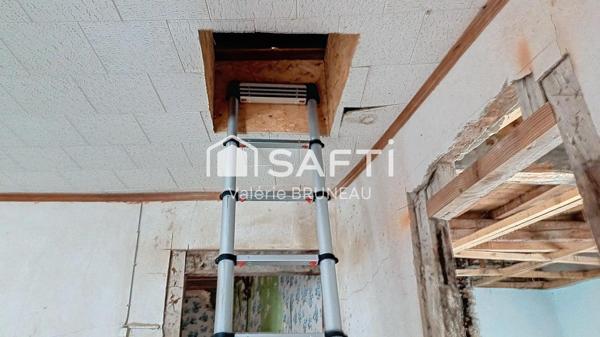 BATISSE A RENOVER DE 460 M2 AU CENTRE VILLAGE