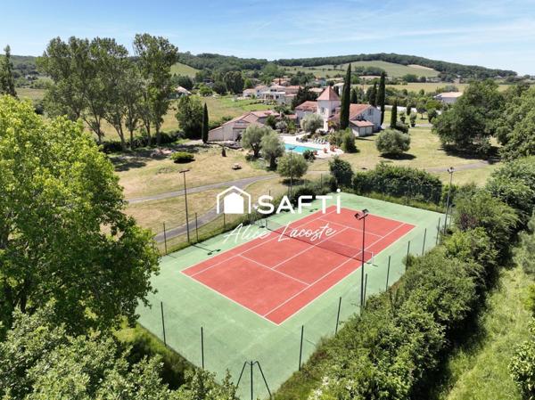 Propriété avec parc, piscine, tennis et étang