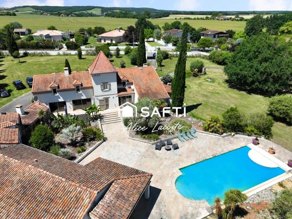 Propriété avec parc, piscine, tennis et étang