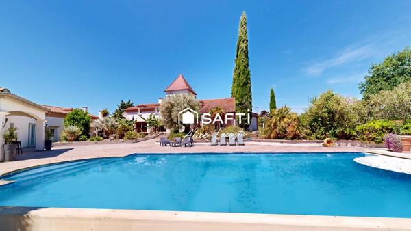 Propriété avec parc, piscine, tennis et étang