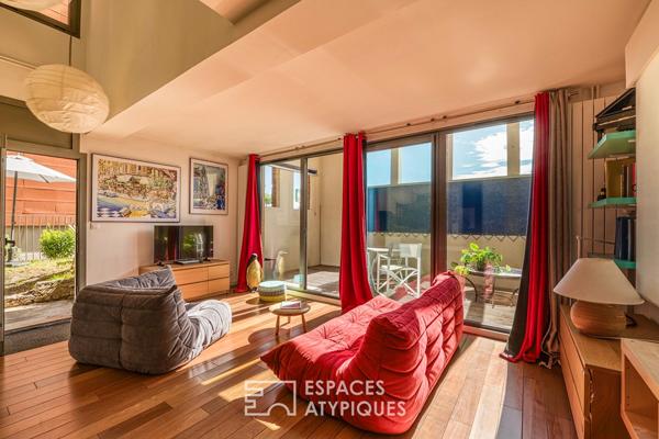 Loft duplex avec loggia et jardin, dans un ancien batiment portuaire