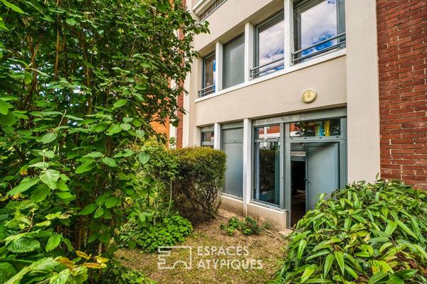 Loft duplex avec loggia et jardin, dans un ancien batiment portuaire