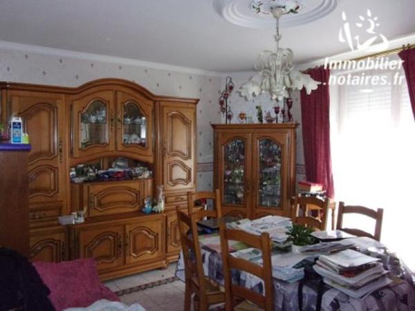 UNE MAISON A USAGE D'HABITATION