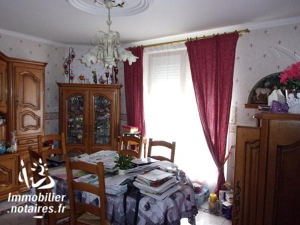 UNE MAISON A USAGE D'HABITATION