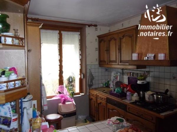 UNE MAISON A USAGE D'HABITATION