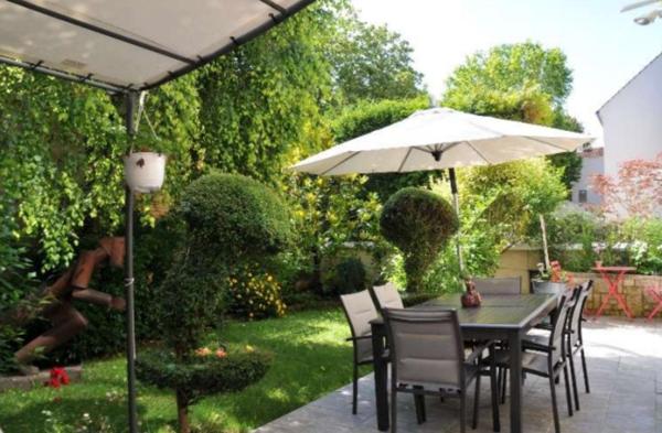 Maison lumineuse avec jardin et rooftop aux Lilas