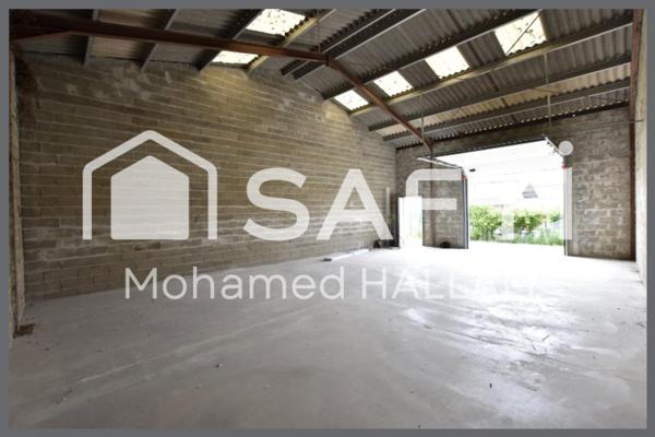 Garage de 100 m², viabilisé, centre ville