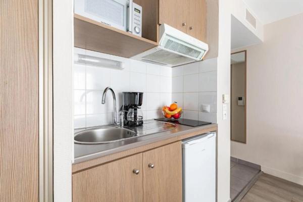 INVESTISSEMENT LMNP À FORTE RENTABILITÉ (7,97 %) – STUDIO EN RÉSIDENCE D'AFFAIRES