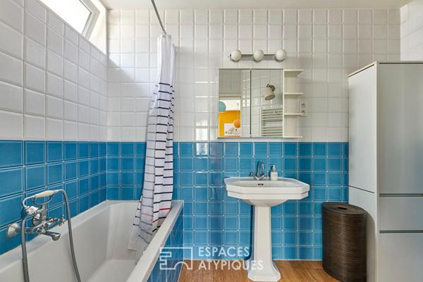 Triplex lumineux en dernier étage aux allures de maison perchée