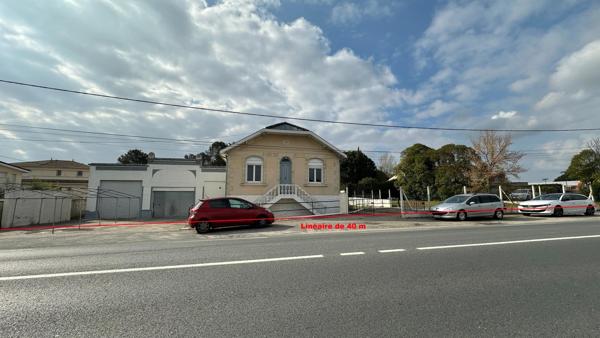 LOCAL COMMERCIAL avec MAISON sur 1000 M2 BORDURE ANCIENNE NATIONALE 10
