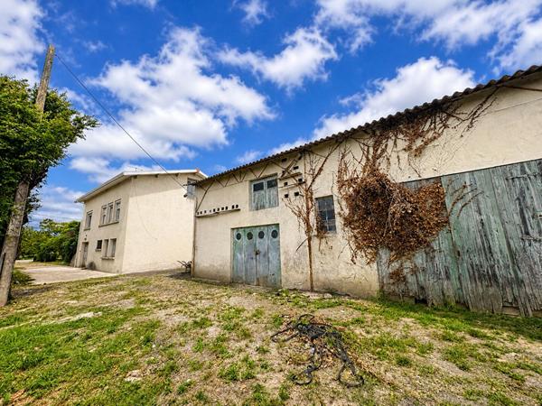 Maison/ Immeuble fort potentiel.